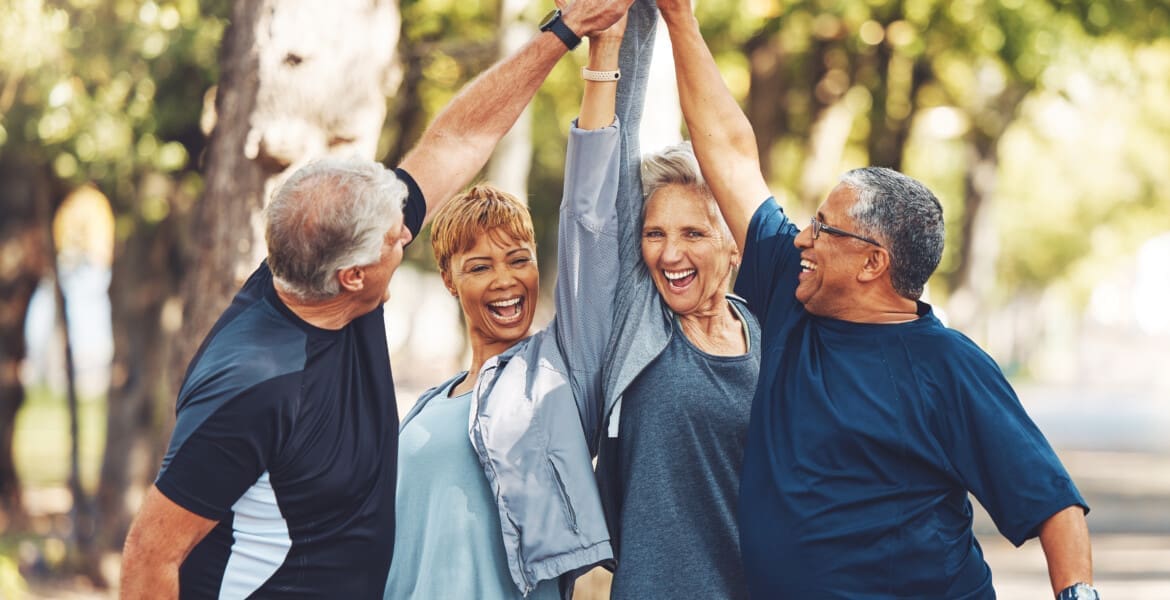 Happy, senior or people high five for fitness training goals, workout target or exercise achievement